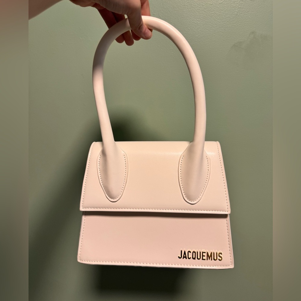 Medium Size Purse/crossbody with adjustable strap.